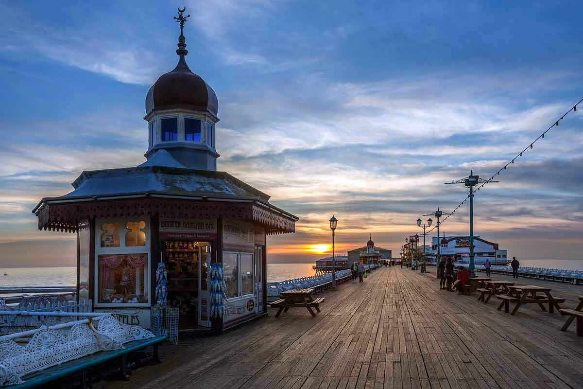 family things to do in blackpool The old North Pier at sunset in Blackpool on the northwest coast of England.