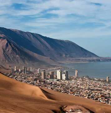 Iquique Behind A Huge Dune, Northern Chile