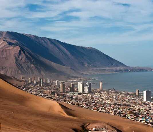 Iquique Behind A Huge Dune, Northern Chile