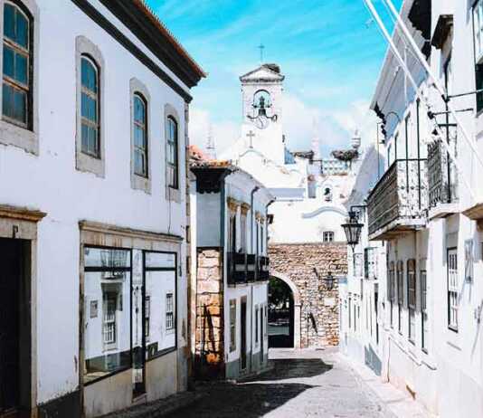 faro town white buildings and and narrow alley