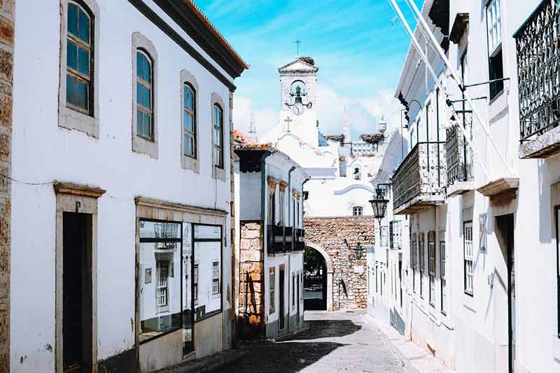 faro town white buildings and and narrow alley