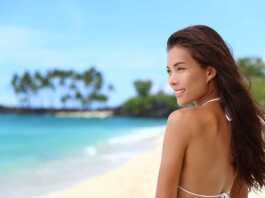 Woman with long hair on one of the fiji beaches