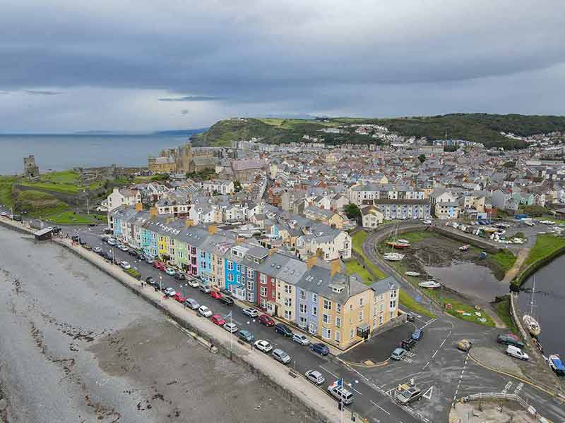 Aerial view of South Beach Promenade At Aberystwyth With The Old Castle