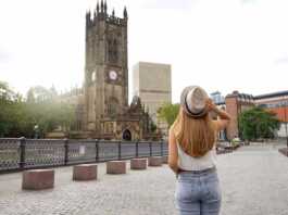 Beautiful Blonde Girl With Hat Walking In Manchester City