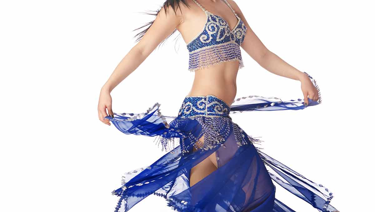 fun things to do in istanbul at night Belly dancer in blue traditional dress on a white background.
