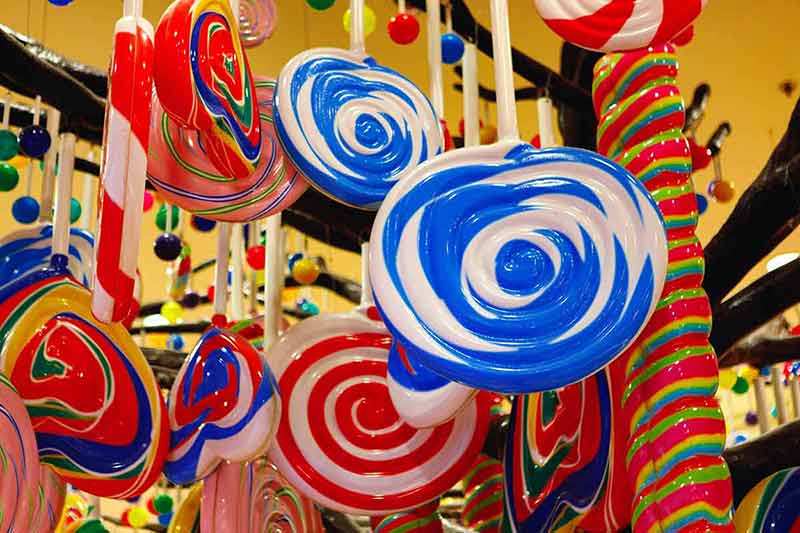 fun things to do in jacksonville fl Lollipops and candies hanging from ceiling in a shop, close up.