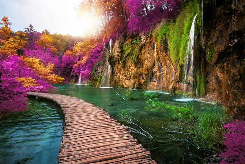 fun things to do in zagreb Beautiful wooden path trail for nature trekking with lakes and waterfall landscape in Plitvice Lakes National Park, UNESCO natural world heritage and famous travel destination of Croatia.