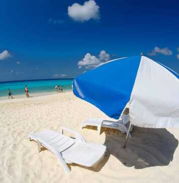 Beach And Crystal Clear Waters Of Grand Cayman