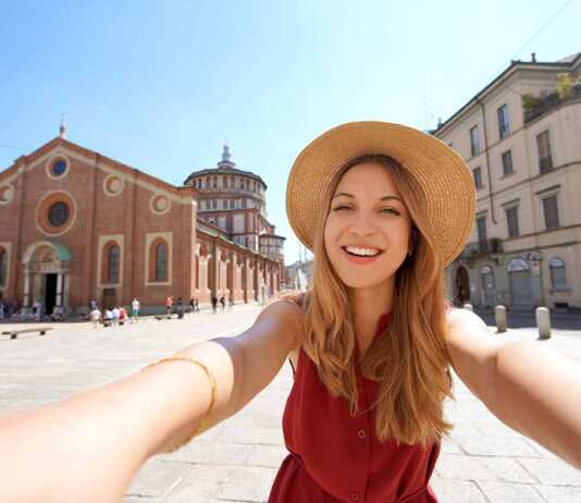 Beautiful Fashion Girl Takes Self Portrait With The Church Of Santa Maria Delle Grazie