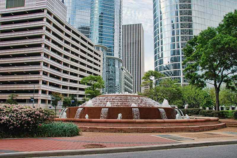 fountain and modern skyscrapers in Houston