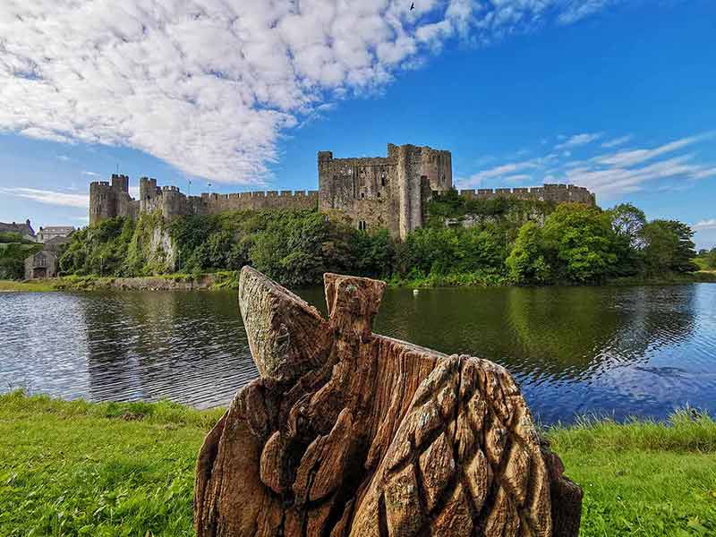 A Stunning View Of Pembroke Castle From Across The Moat