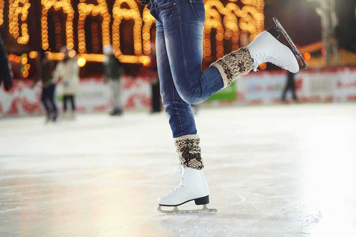 Young Woman Skating On An Ice Rink