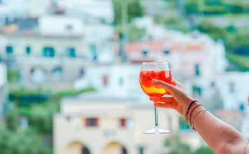 italian drinks alcoholic background of beautiful old italian village on Amalfi coast