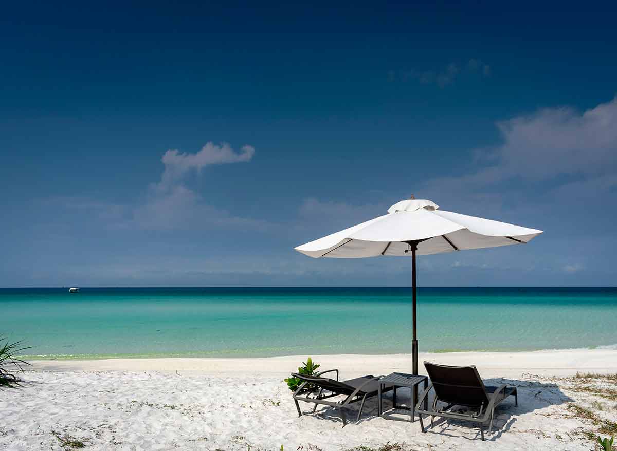 koh rong cambodia beaches beach lounges and white umbrella