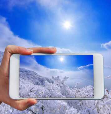 Hand Holding Smart Phone Take A Photo At Deogyusan Mountains