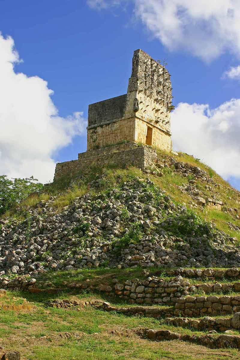 labna mayan ruins over blue sky