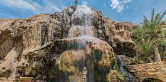 Jordan Landmarks That Will Leave You Speechless landmarks in jordan one woman bathing at ma'in hot springs waterfall