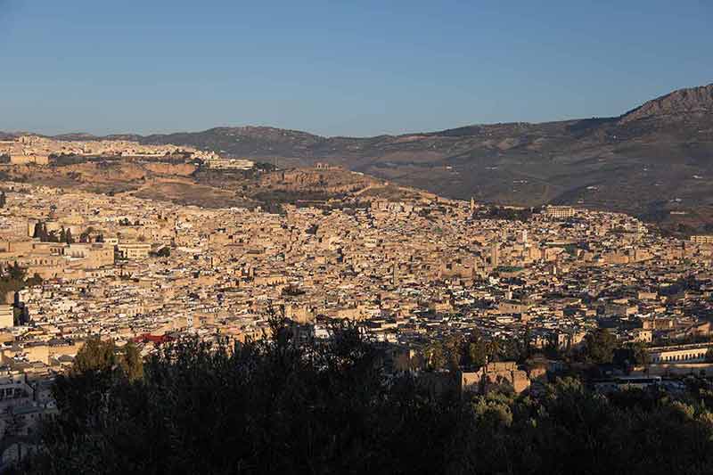 Fes Morocco Cityscape With Medina In Centre Seen From Hills Above