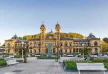 20 Amazing Cities In Spain That Deserve A Spot On Your Bucket List San Sebastian town hall with blue sky