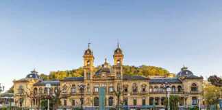 20 Amazing Cities In Spain That Deserve A Spot On Your Bucket List San Sebastian town hall with blue sky