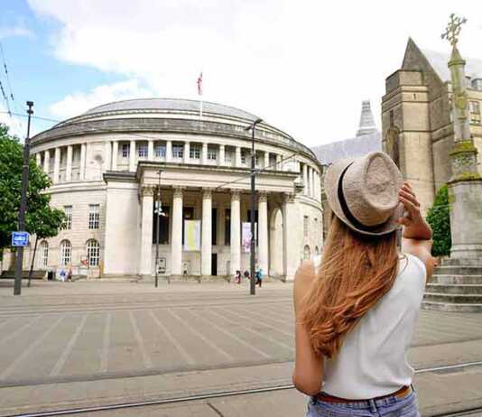 woman looking at St Peter square in Manchester City