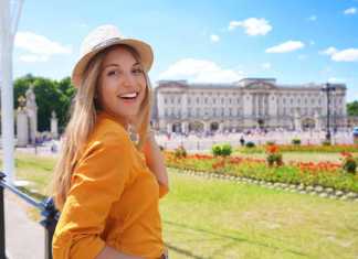 Spring in London: Why This Is the City’s Most Magical Season london in the spring Portrait of young tourist woman visiting London, United Kingdom. Looking at camera.