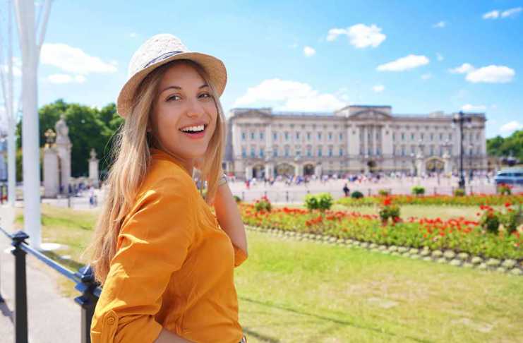 Spring in London: Why This Is the City’s Most Magical Season london in the spring Portrait of young tourist woman visiting London, United Kingdom. Looking at camera.