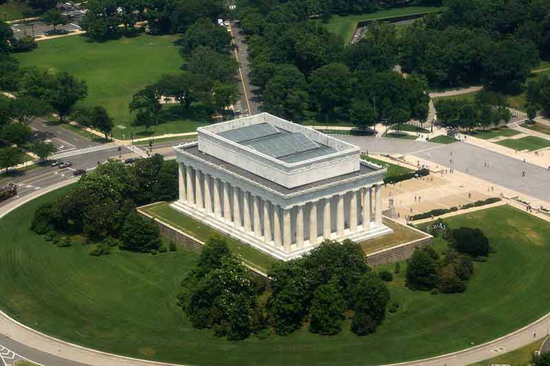 Aerial of landmark Abraham Lincoln Memorial in Washington, D.C. seen from back