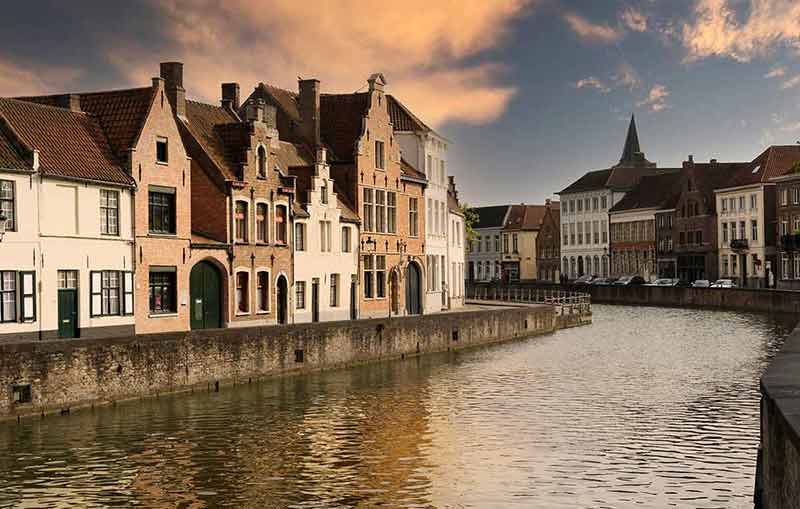 Medieval Belgian City Of Bruges buildings by a canal