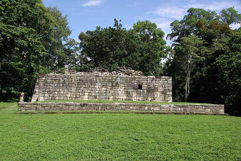 major landmarks in guatemala ruins surrounded by trees