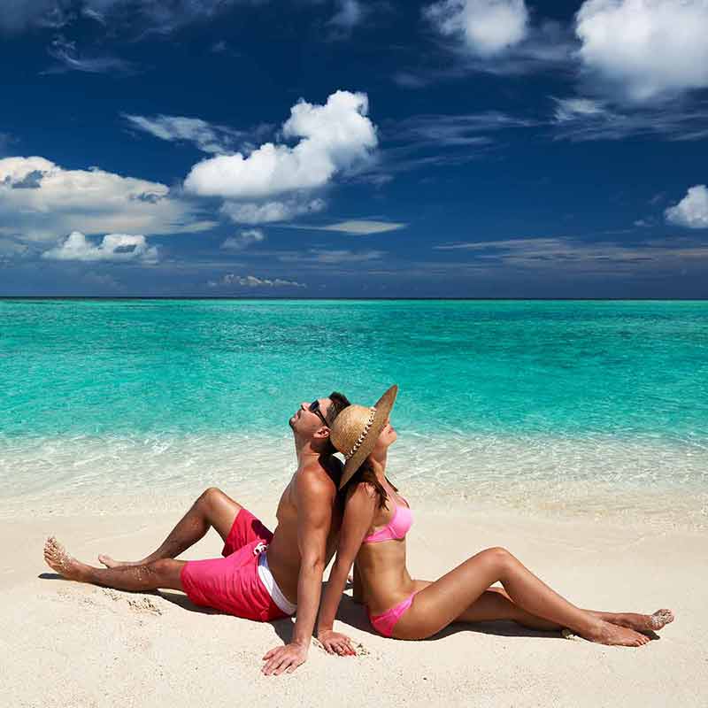 maldives beautiful beaches Couple on a tropical Maldives beach
