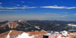 manitou springs pikes peak train with sprinkling of snow