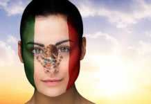 mexican culture traditions woman with Mexico flag painted on her face