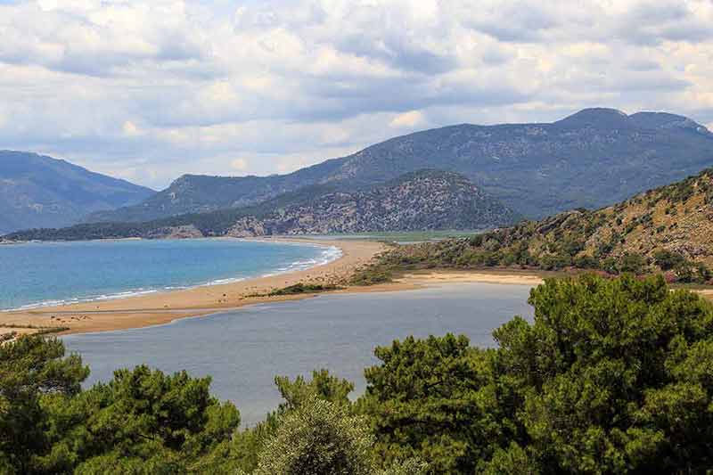 most beautiful beaches in turkey View of connection point of salty and fresh water in Iztuzu Beach in Dalyan.