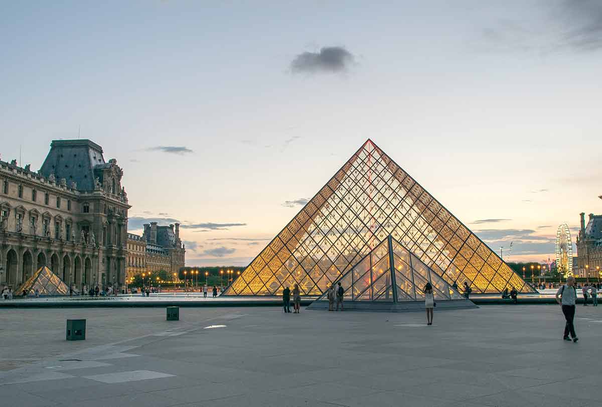 museums in paris louvre pyramid at sunset