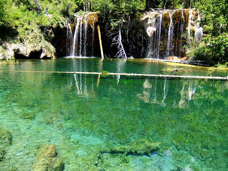 green waters of national landmark in colorado hanging lake