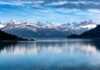 national parks in anchorage alaska snow-capped mountains reflected in the wter