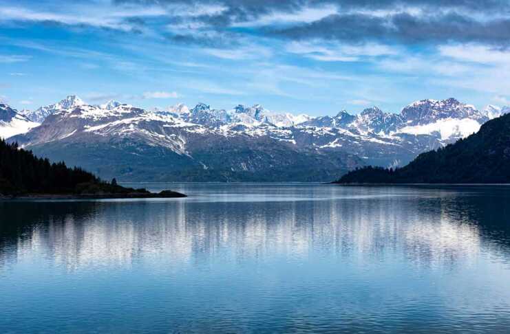 20 National Parks In Alaska That Feel Unreal national parks in anchorage alaska snow-capped mountains reflected in the wter