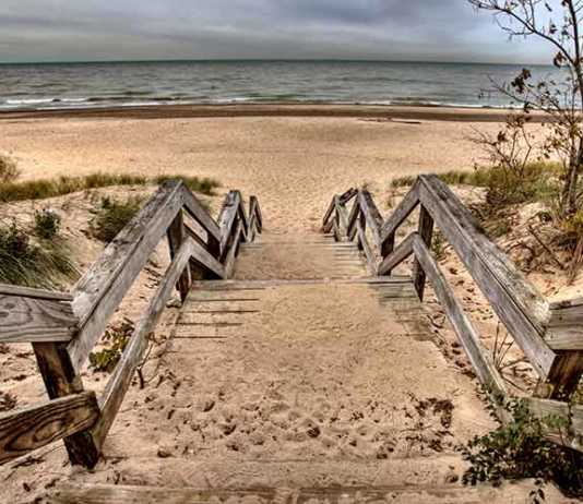 national parks in indiana timber staircase leading onto the sand