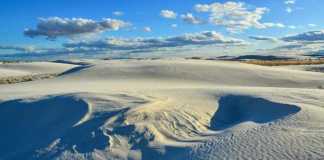 national parks in new mexico vast dunes aerial view with blue sky