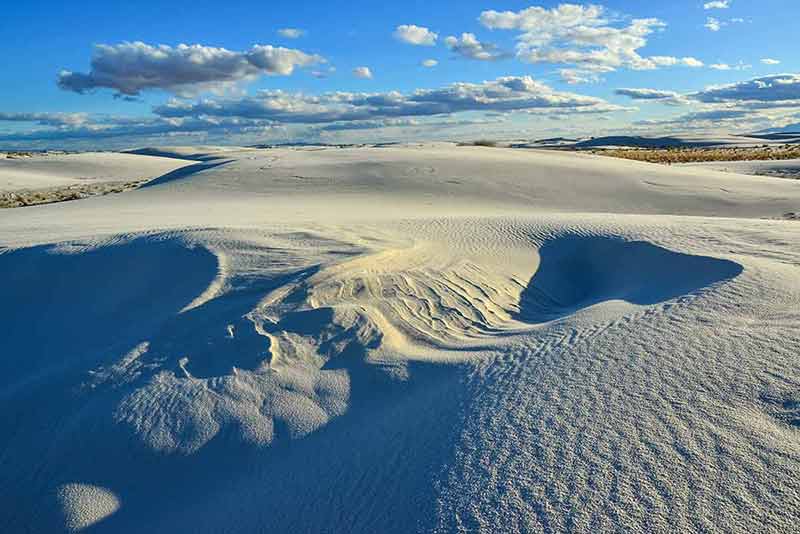national parks in new mexico vast dunes aerial view with blue sky