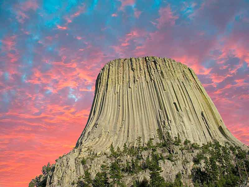 national parks wyoming montana colours of sunset over Devils Tower, Wyoming, U.S.A.
