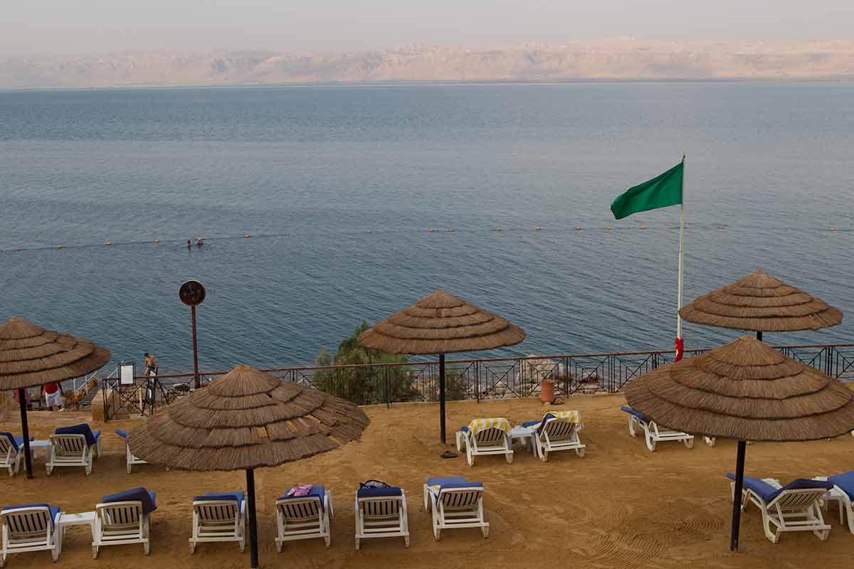 natural landmark in jordan umbrellas in a resort by the Dead Sea