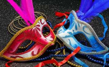 new orleans museums red and blue masks with feathers