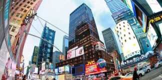 New York to San Francisco: The Epic Road Trip Every American Should Take Once Times Square, featured with Broadway Theaters and huge number of LED signs fish eye view