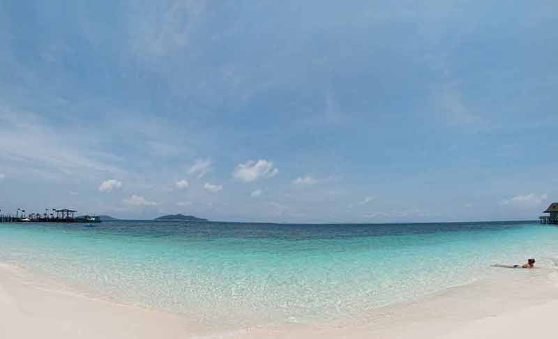 nicest beaches in malaysia Panoramic view of a beautiful beach with turquoise water in Rawa island Malaysia
