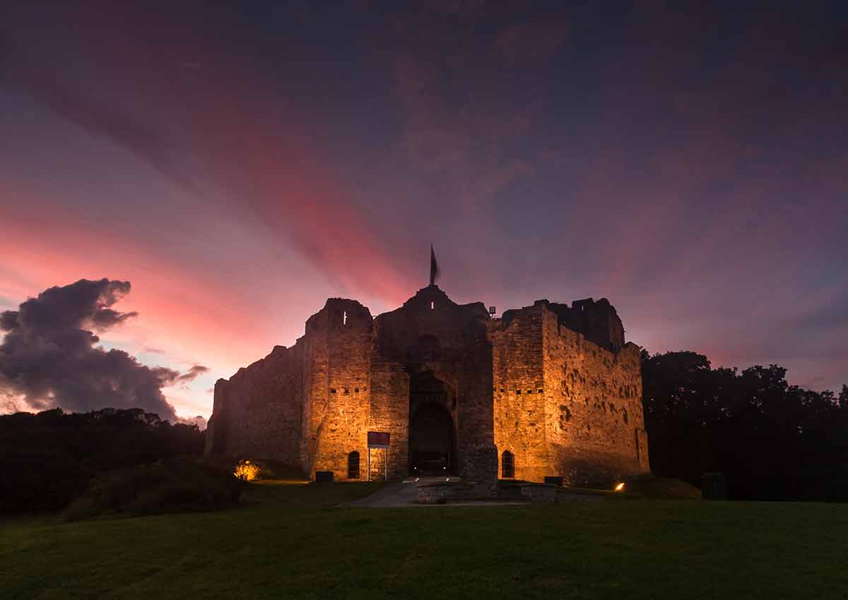 oystermouth castle at sunset swansea