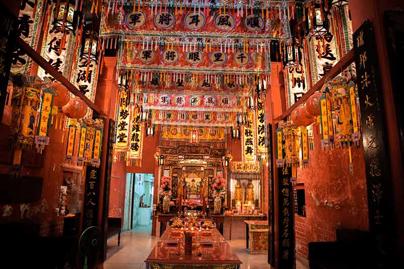 internal of a temple with red decorations