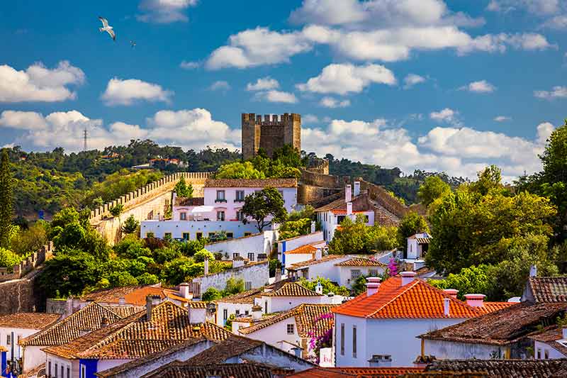 Obidos, Portugal Stonewalled City With Medieval Fortress