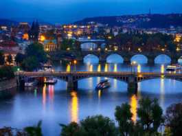 prague at night bridges and buildings